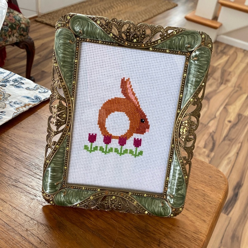 Hand Crafted Bunny Behind Cross-Stitch in frame